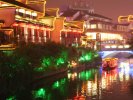 Neon boat on neon reflections